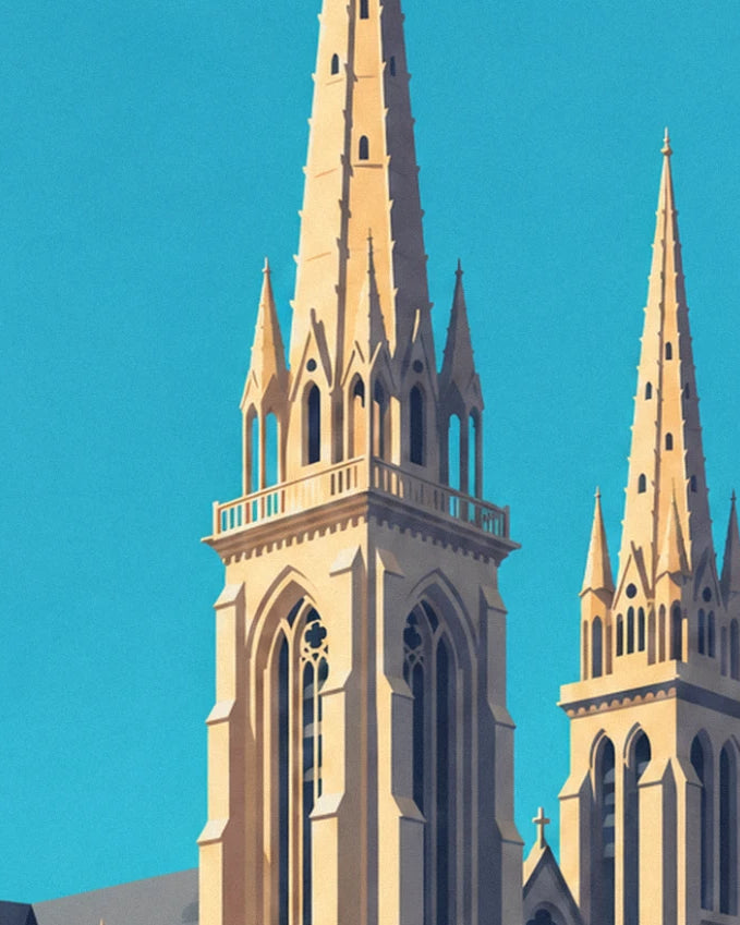 The cathedral's 2 pale stone spires beneath a turquoise blue sky