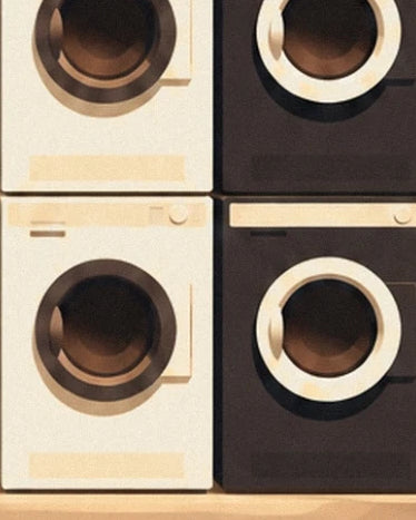 The cream and charcoal washing machines with large dark round doors