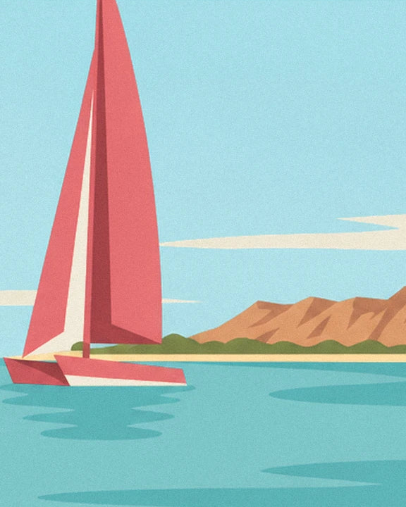 Le voilier aux voiles rouges sur l'eau turquoise, avec la montagne de Diamond Head au loin