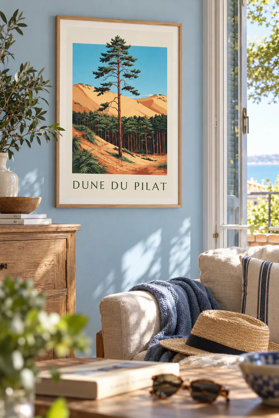 Poster of a beach and catamaran at the foot of the Dune du Pilat: framed on the wall