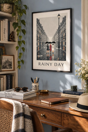 Poster of 3 women in the rain with black umbrellas: framed on the wall