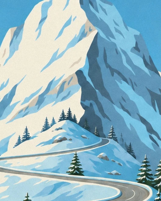 The winding road at the foot of the great snow-covered rock faces of the Alpes