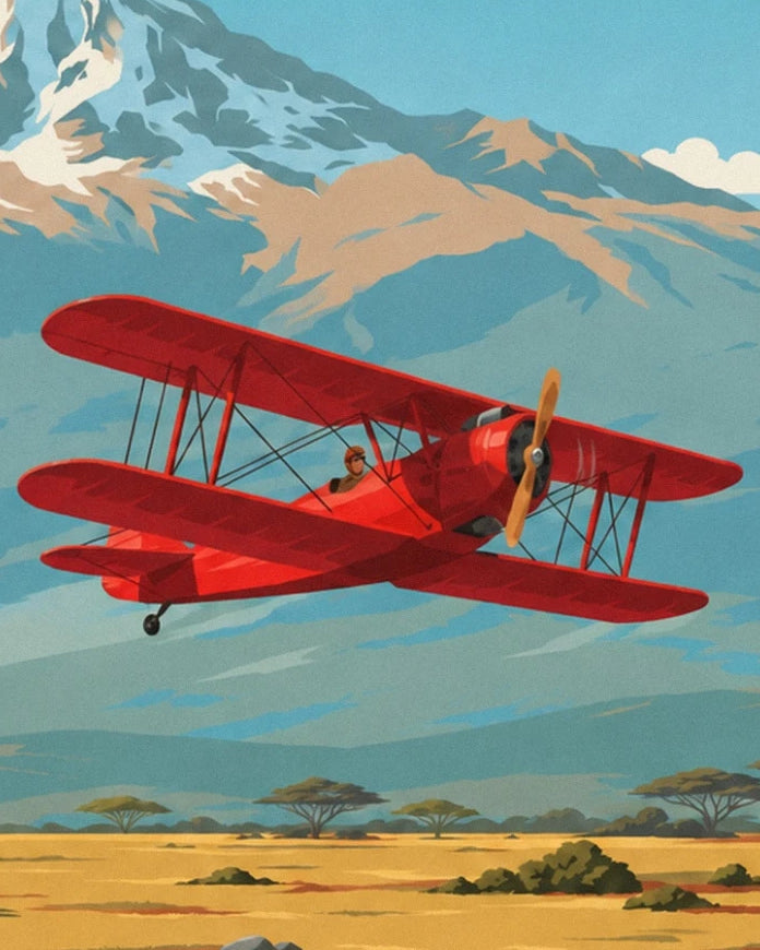 Le biplan rouge et son pilote devant les pentes enneigées du Kilimandjaro