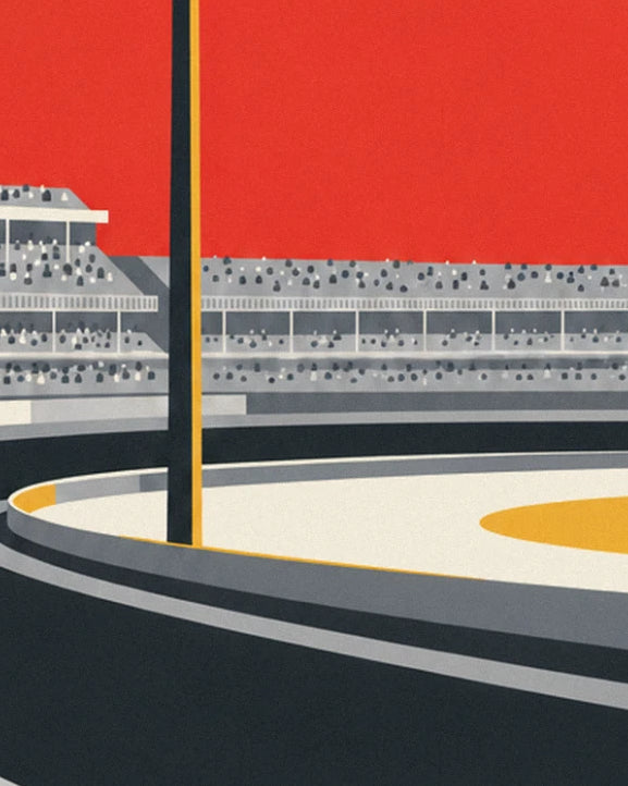 The packed stands beneath a red sky, beside the cream track and its grey-edged bend