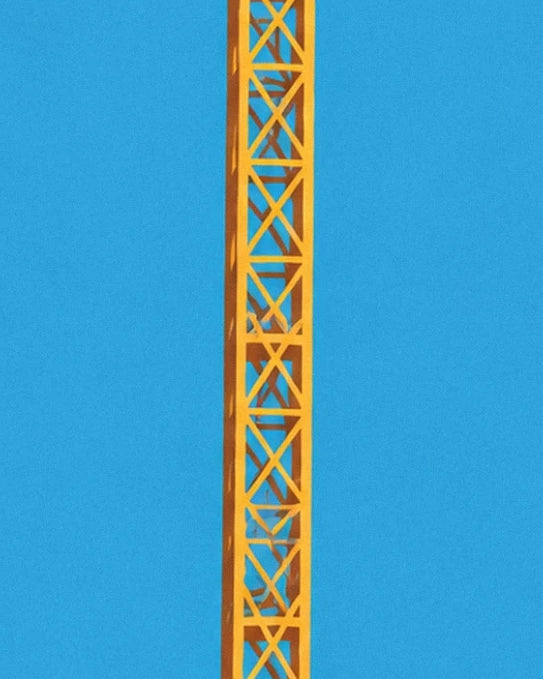 The yellow lattice structure of the Titan crane against the blue sky