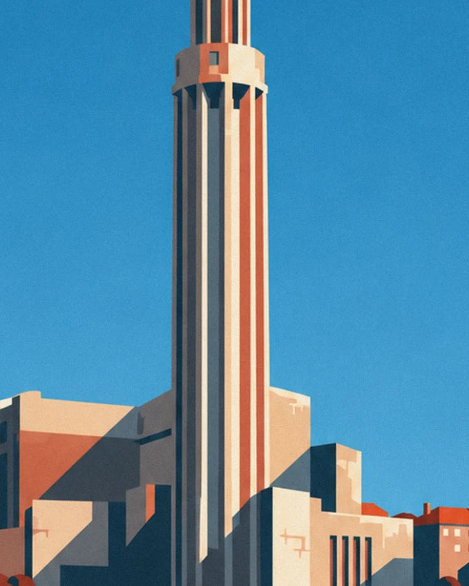 The bell tower of église Saint-Joseph, its shaft striped pink and beige, against a blue sky