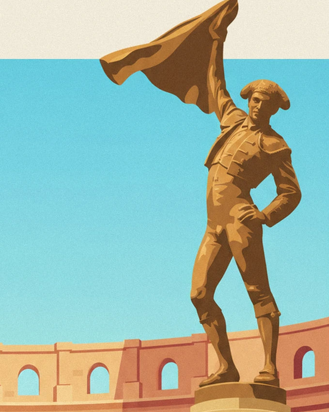La statue dorée de Nimeño II, cape levée devant les arènes de Nîmes