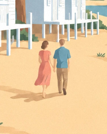 A couple seen from behind, in a coral dress and blue shirt, between the huts on the sand