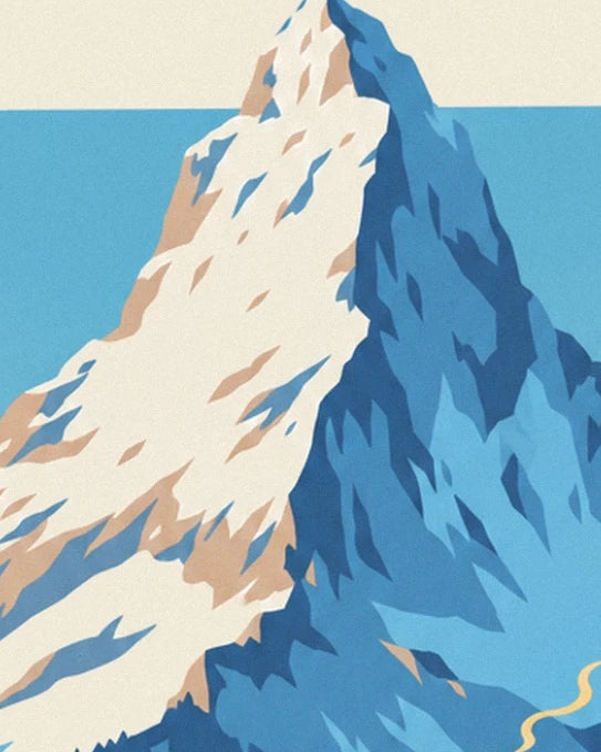 The snow-covered peak with steep faces in creamy white and blue shadows