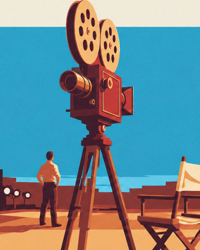 The camera with 2 reels on its wooden tripod, a man seen from behind and a director's chair