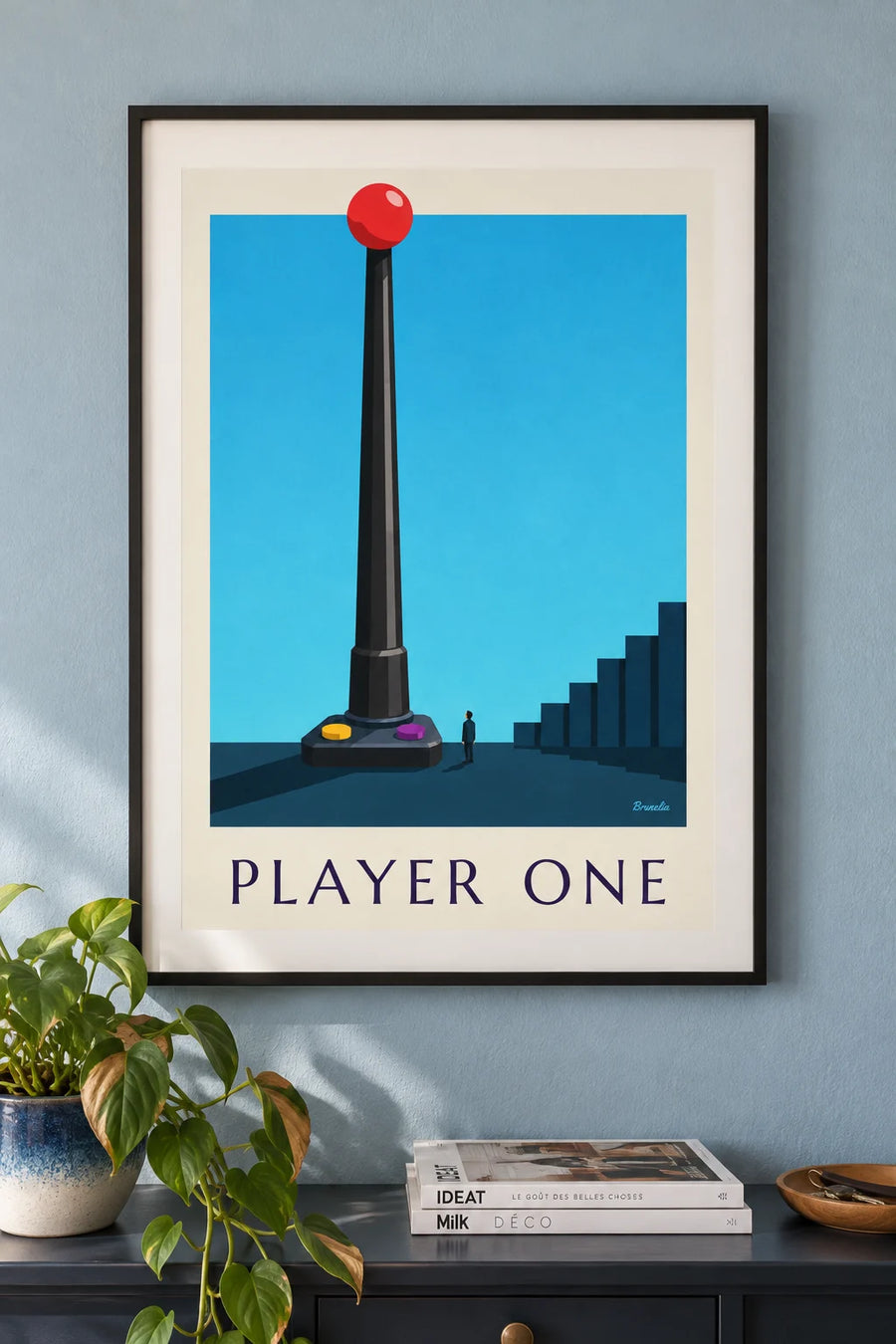 Poster of a pixel art video game joystick: framed on the wall