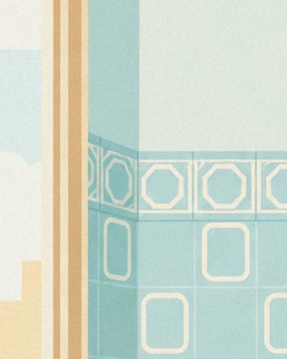 Le carrelage bleu aux motifs géométriques crème, près d’un encadrement doré