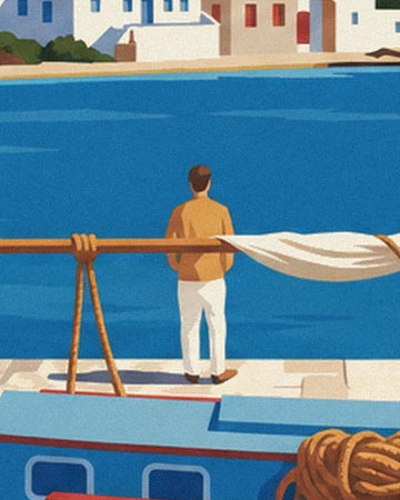 A man in white trousers facing the harbour, behind the boom and furled sail of the caique