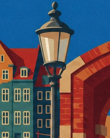 An old street lamp in front of the colourful façades and a red brick arch in Nyhavn