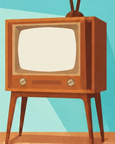 La télévision en bois sur pieds, avec son écran crème et ses 2 boutons rotatifs