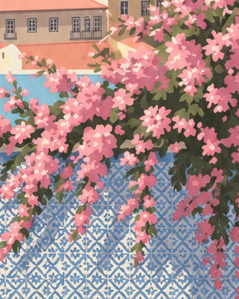 Clusters of pink flowers trailing over blue and white azulejo tiles