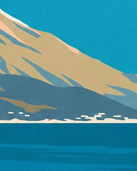Ochre and blue hills above the pale shore and turquoise sea
