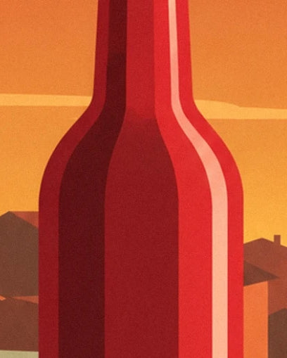 A red bottle with orange reflections in front of the city rooftops