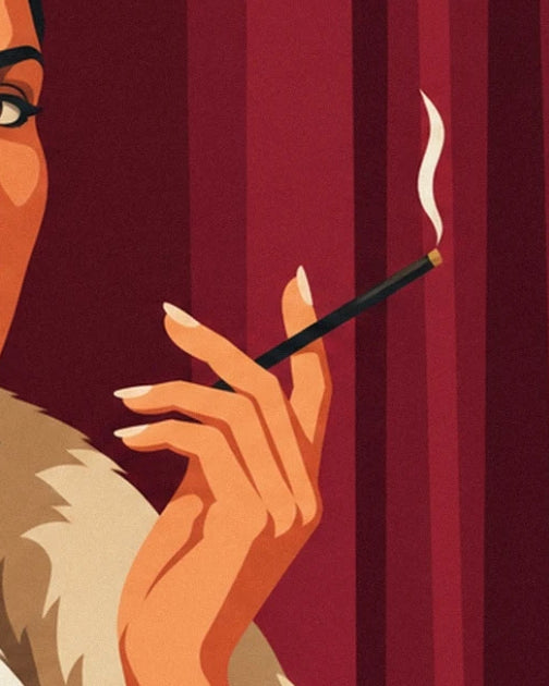 The hand with pale nails holding a black cigarette holder in front of the red curtain