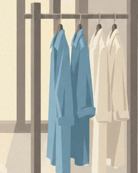 On the drying rail, 2 blue shirts and 2 white blouses hang on their hangers