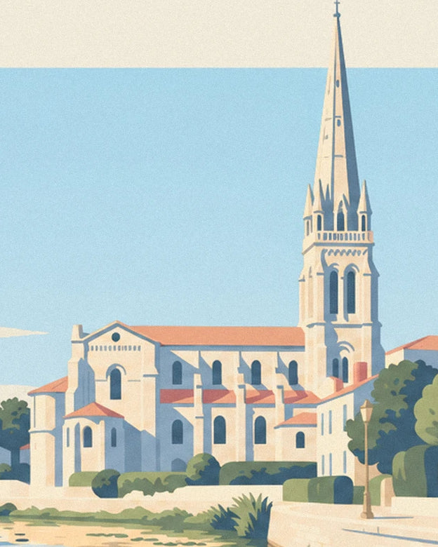 La basilique d’Avesnières, sa haute flèche et ses toits orangés au bord de la Mayenne