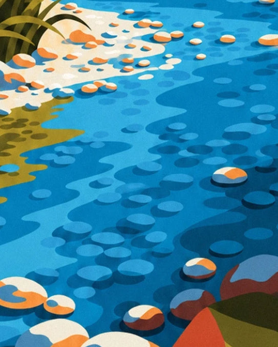 The pale and orange pebbles in the blue river water