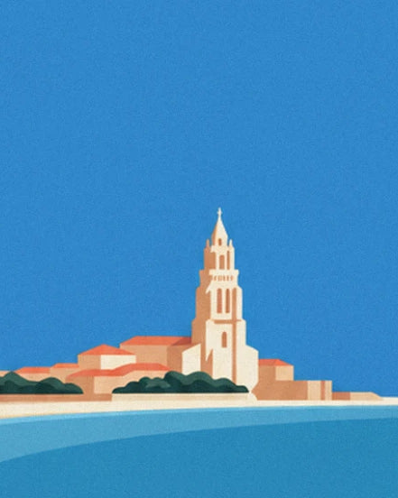 The pale stone bell tower above the orange roofs beside the blue water