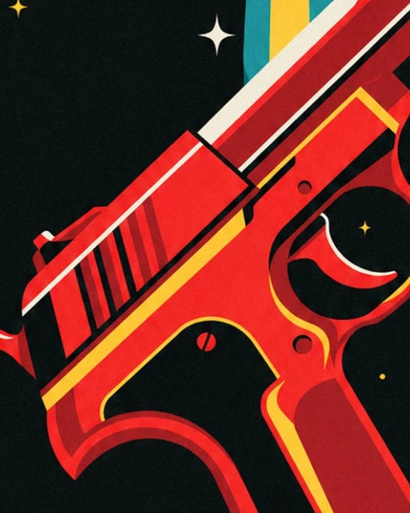 Le pistolet laser rouge aux contours jaunes, avec sa détente et sa poignée