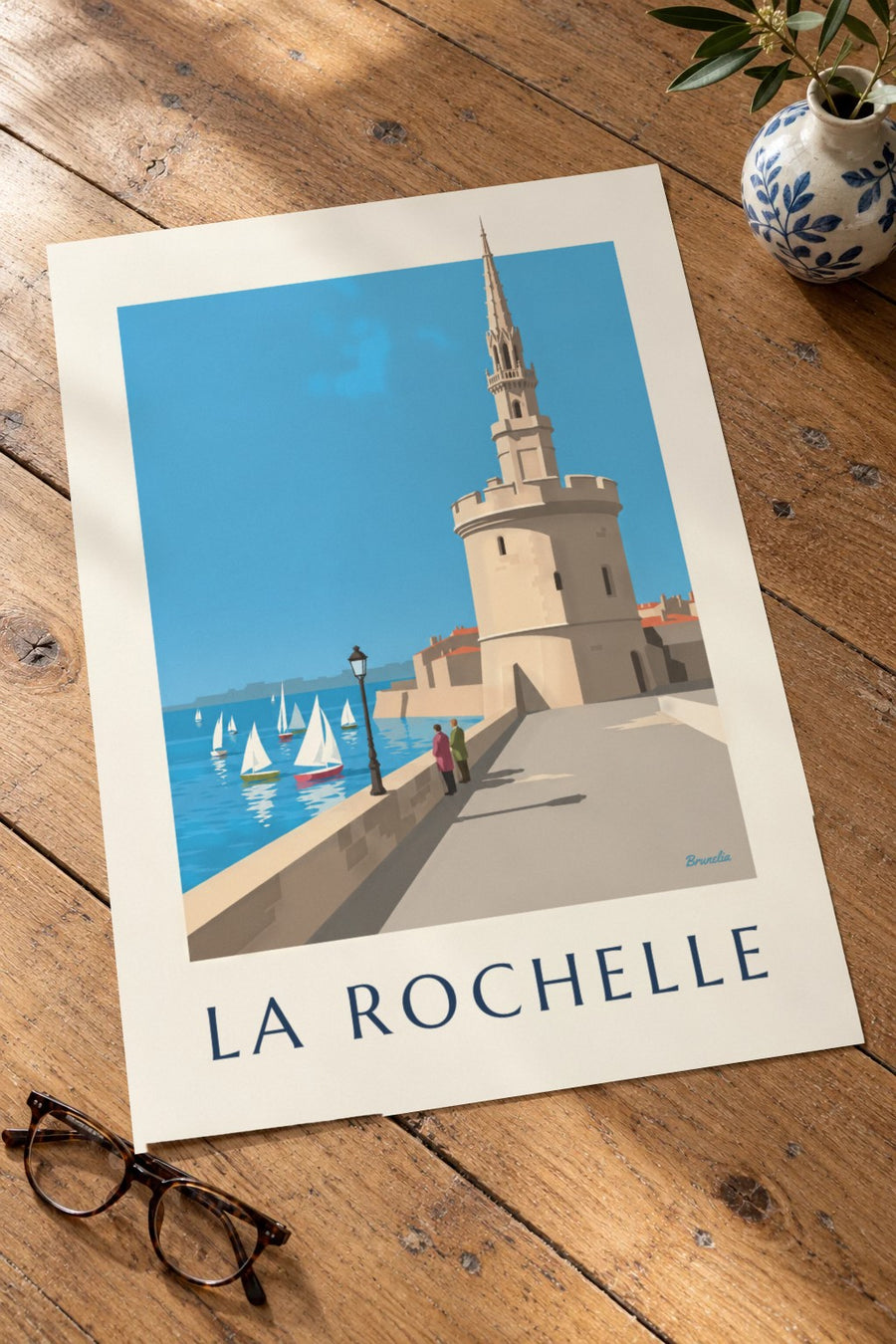Poster Tour de la Lanterne in La Rochelle : neergezet op een tafel