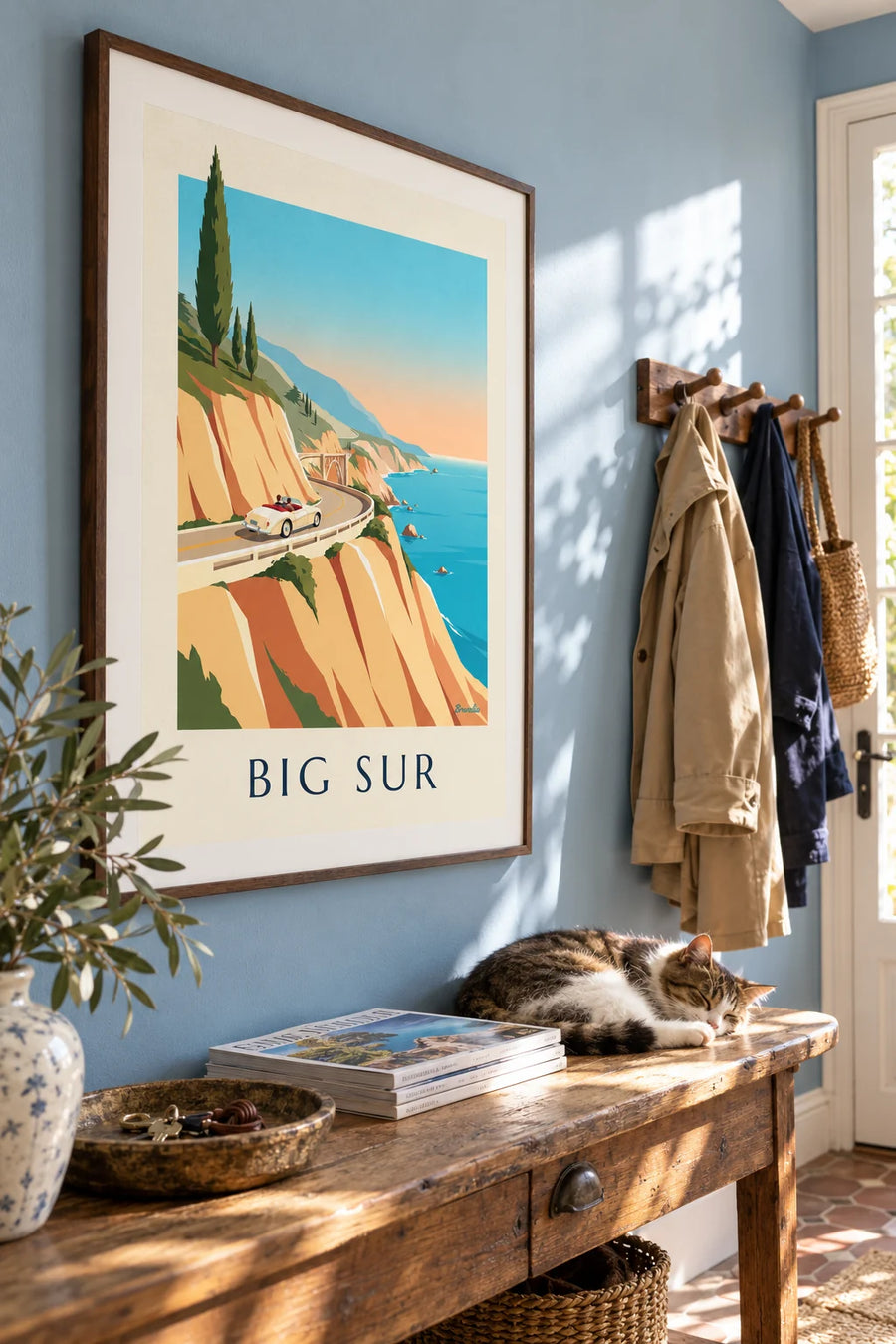 Poster of a convertible on the Big Sur road in California: framed on a wall