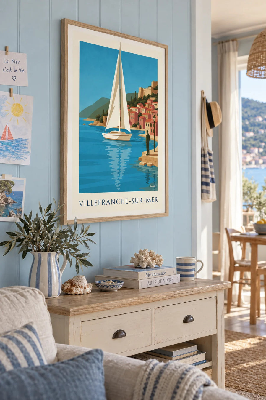 Poster of a sailboat in the harbor of Villefranche-sur-Mer: framed on the wall