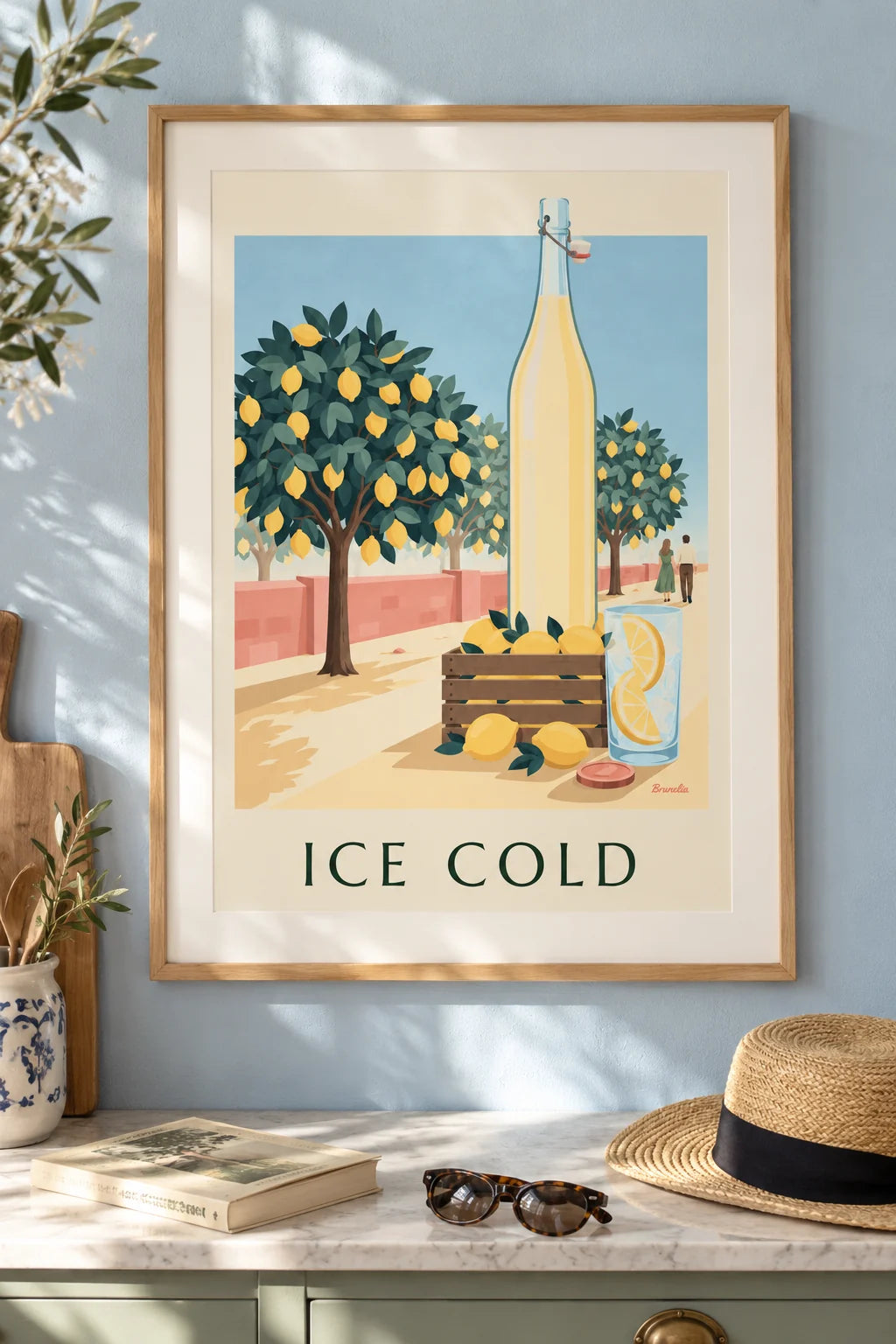 Orchard lemonade bottle and lemon crate poster on the wall