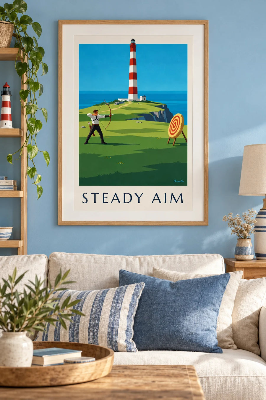 Affiche archer sur une falaise face à la mer et au phare : encadrée au mur