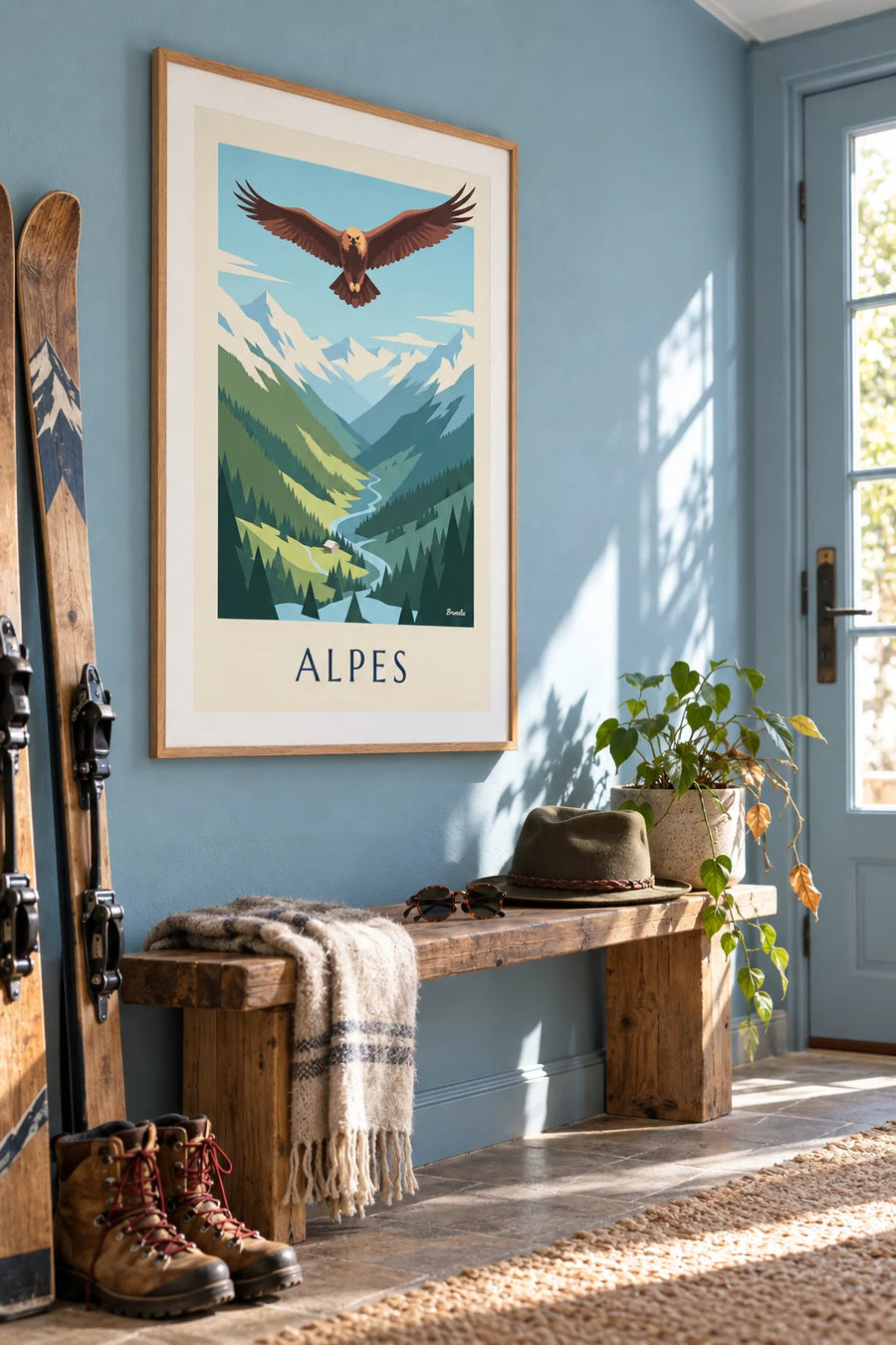 Poster steenarend boven een Alpendal: ingelijst aan de muur