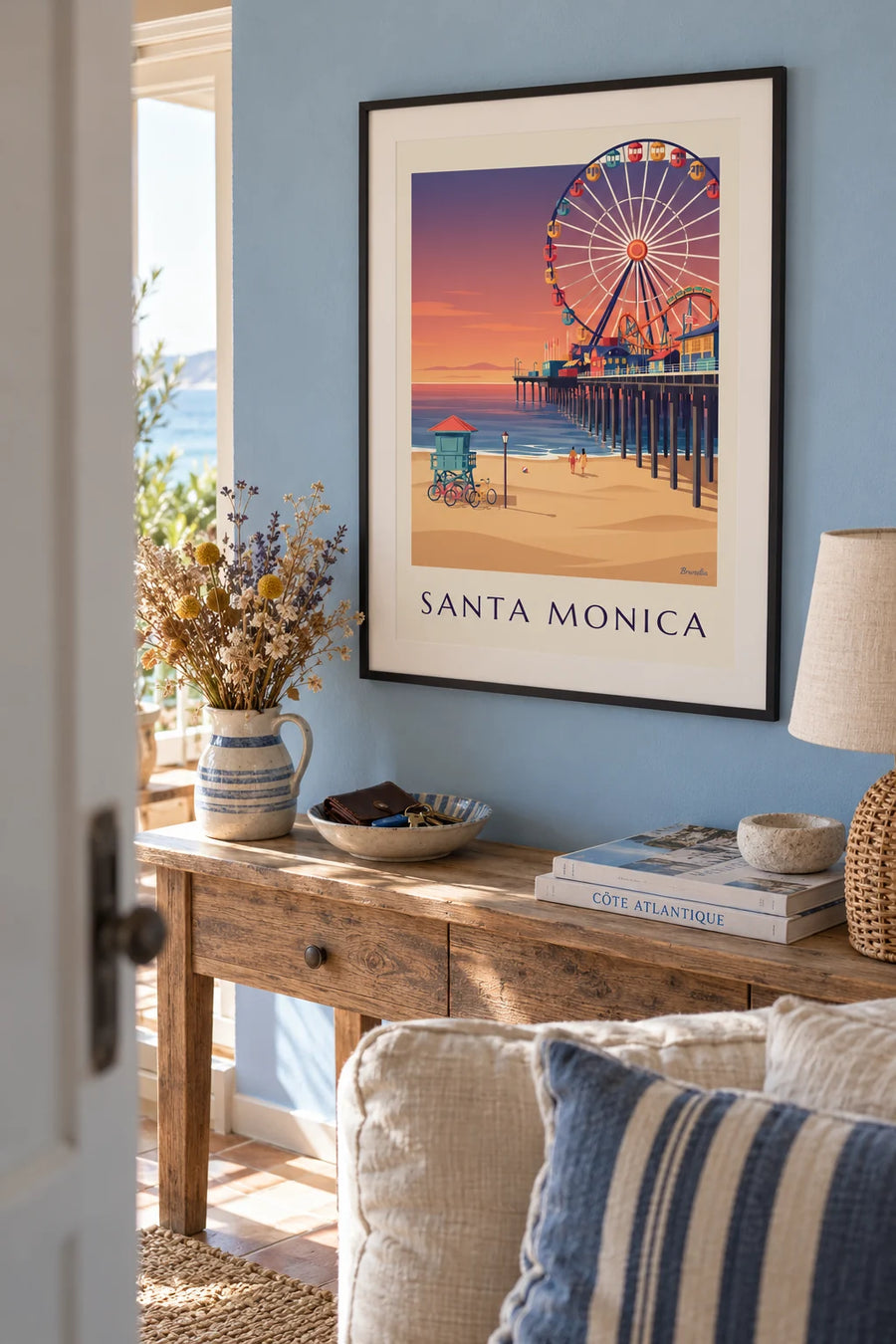 Poster mit dem Santa Monica Pier bei Sonnenuntergang: gerahmt an der Wand
